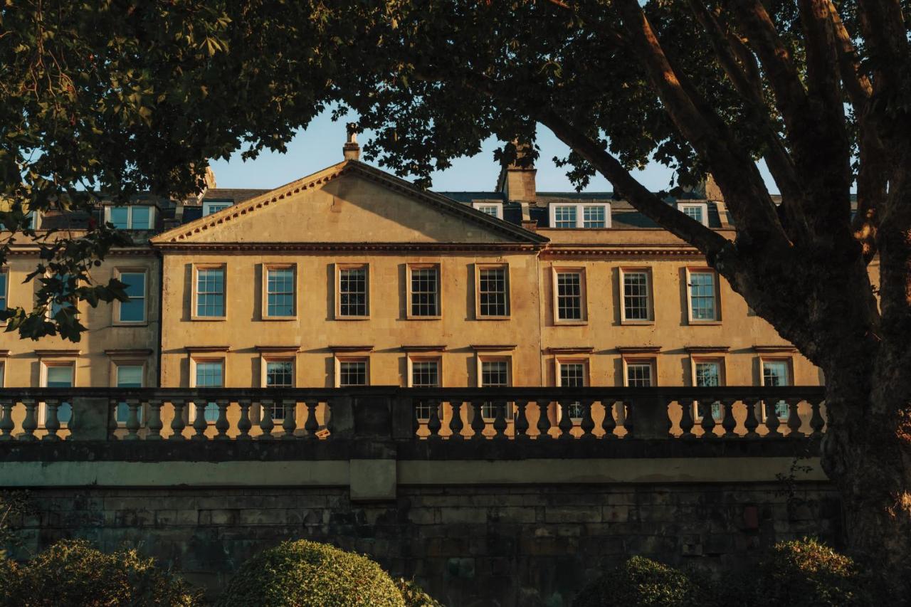 a large building with a fence in front of it at Parade Hotel Bath in Bath